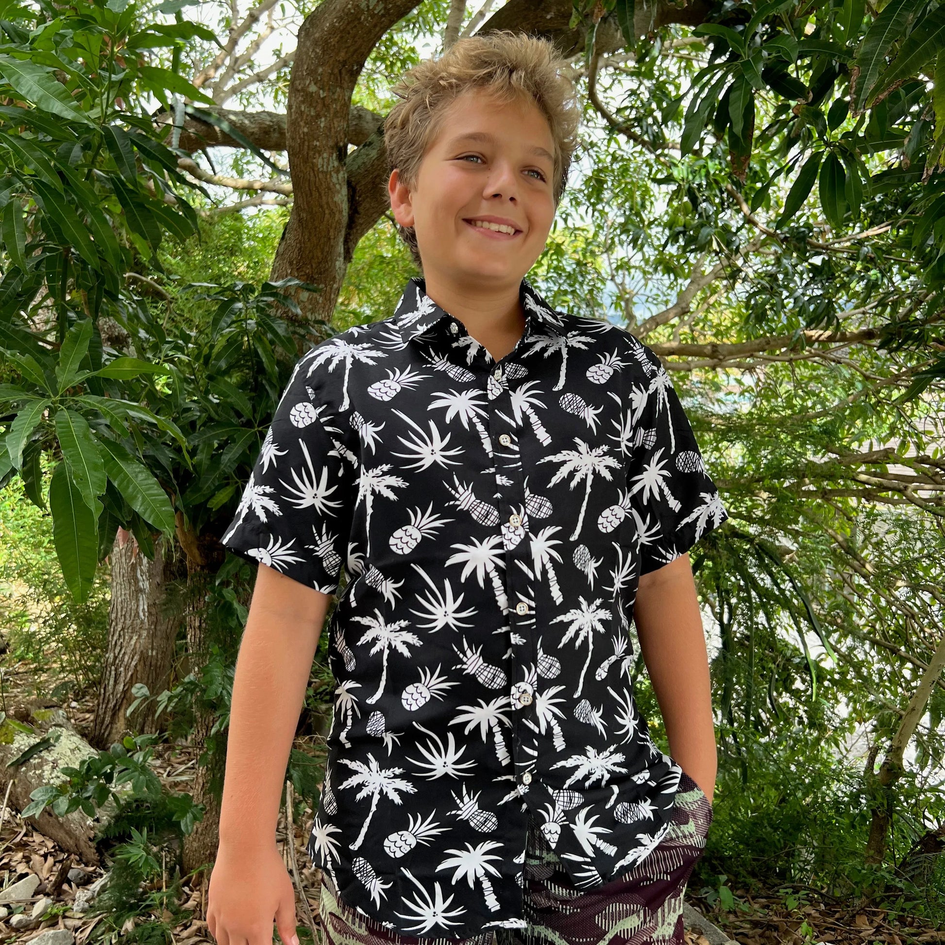 Black shirt with white palm trees and pineapple